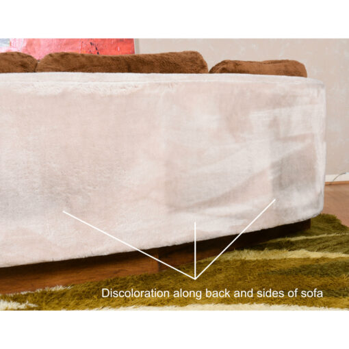 Discoloration on back of 1970s sectional sofa