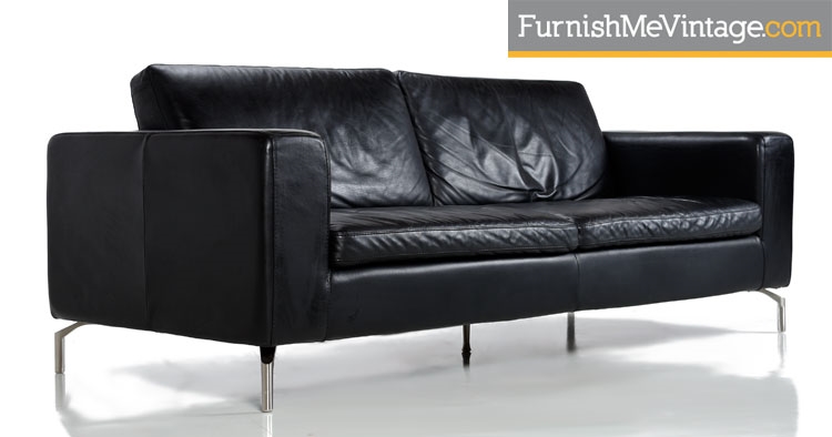 Black leather modern Natuzzi sofa