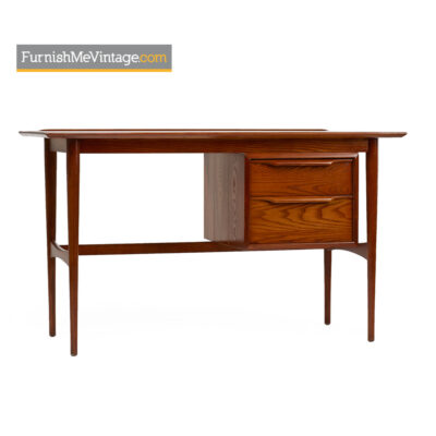 Heywood Wakefield desk with dovetail joinery, sculpted drawer pulls and lip edge top. Solid oak exterior has been fully restored and refinished