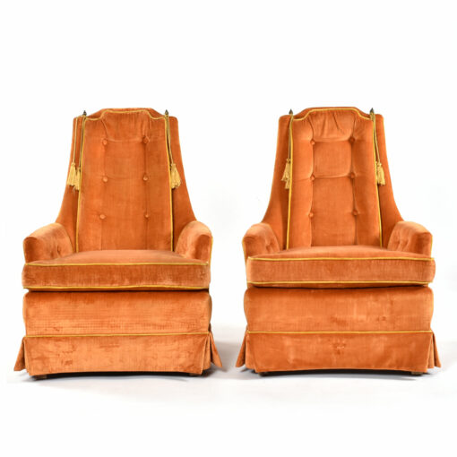 Orange mid-century modern lounge chairs by McAfee