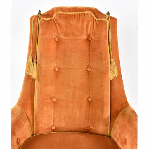 Tufted back rest with gold trim and gold tassels McAfee armchair