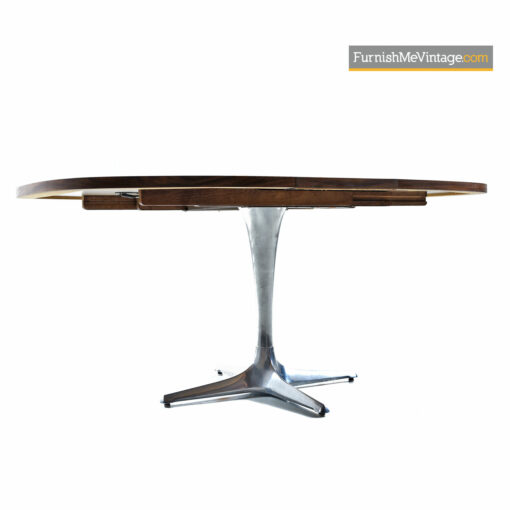The Chromcraft Sculpta dining table accompanies the Unicorn Star Trek chairs designed by Vladimir Kagan.