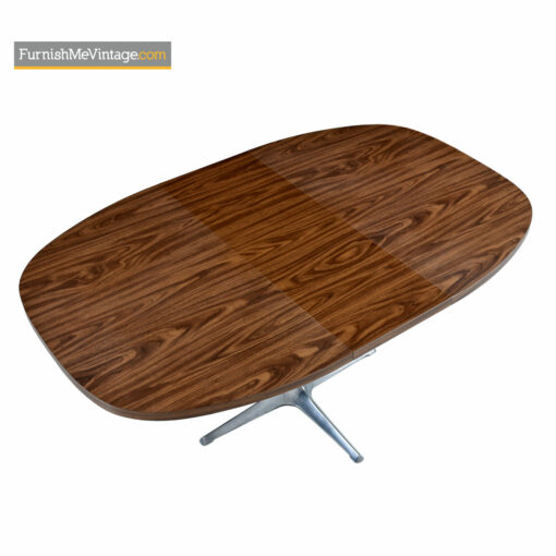 The Chromcraft Sculpta dining table accompanies the Unicorn Star Trek chairs designed by Vladimir Kagan.
