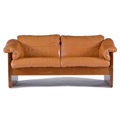 Front view of Mikael Laursen Danish leather and teak loveseat