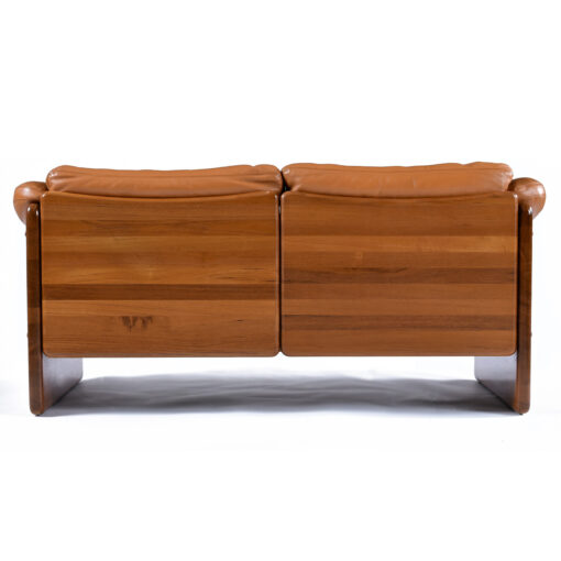 Solid teak wood frame on Mikael Laursen leather Danish loveseat