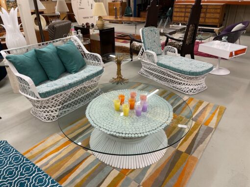 Mid-century modern spun fiberglass outdoor furniture with McGuire round rattan coffee table