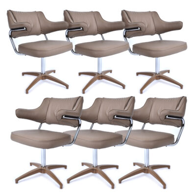 Beige and chrome swivel chairs
