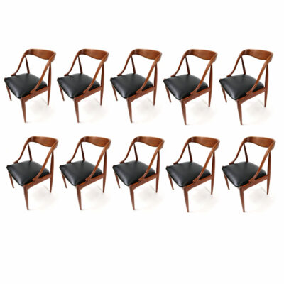 Johannes Andersen for Uldum Mobelfabrik set of 10 vintage 1960s Danish teak dining chairs. Exquisite mid-century modern design on beautifully aged teak.