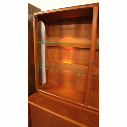Vintage Dyrlund Danish Modern teak china cabinet with lighted display.