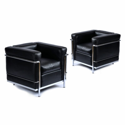 Two LC2 chairs by LeCorbusier for Atelier International Cassina