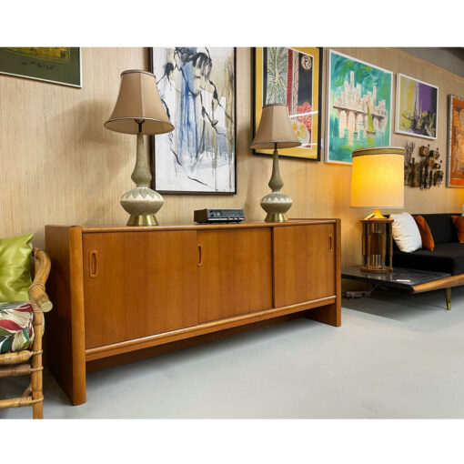 Quartite Creative Corp. genie lamps on teak credenza