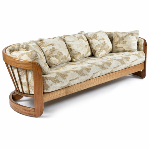 Barrel shaped spindle back curved vintage Howard sofa