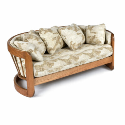 Crescent shaped vintage loveseat sofa by Howard
