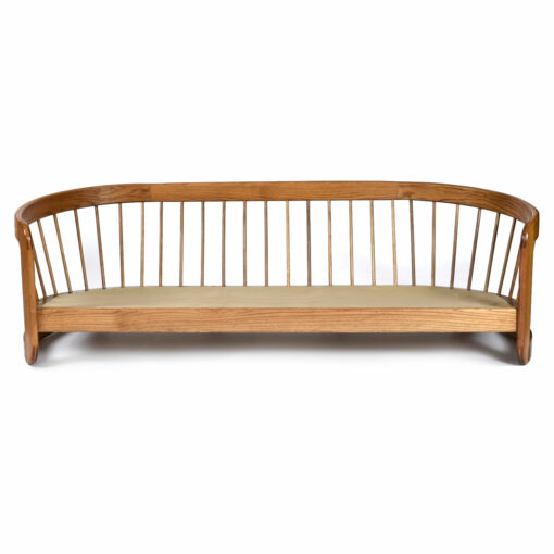 Howard Furniture crescent shaped oak sofa
