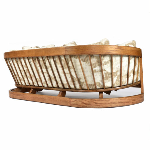 Spindle back curved Howard oak sofa