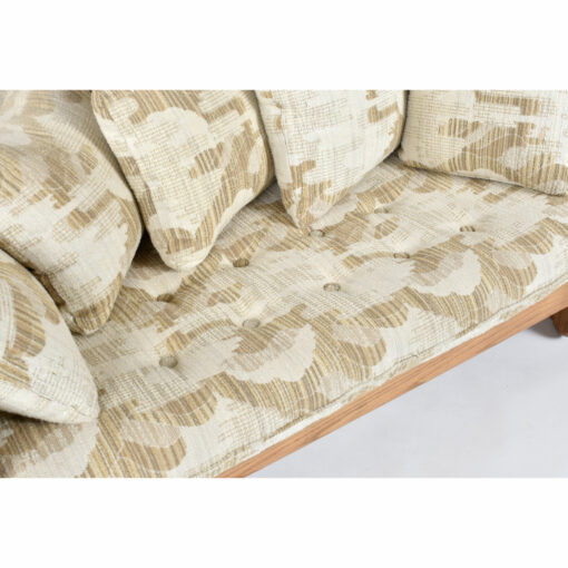Close up on original beige and cream colored Howard loveseat sofa cushions