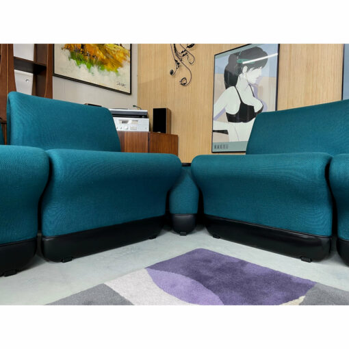 Teal Artopex modular seating group with black vinyl trim