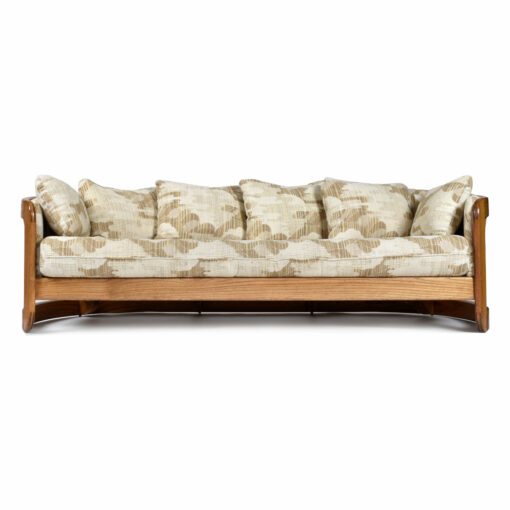 Beige, cream and brown Howard Furniture crescent shaped vintage sofa