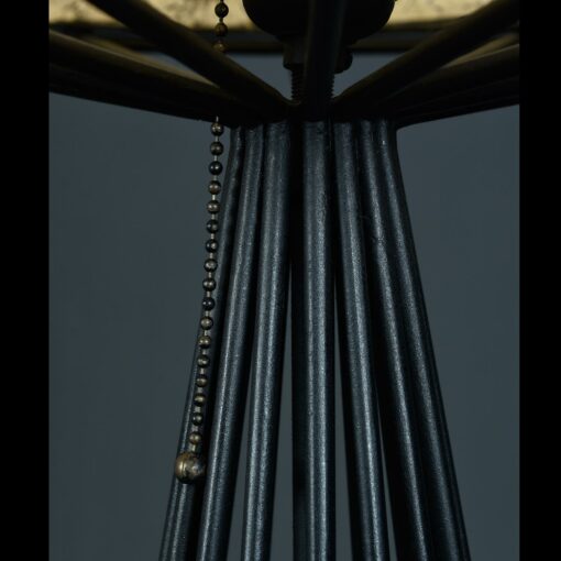 Tony Paul with atomic age wrought iron wire frame