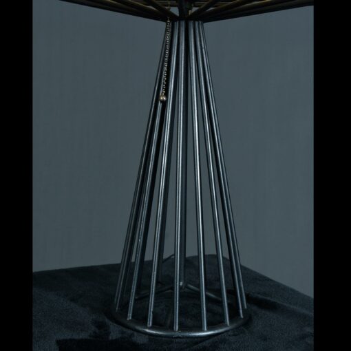 Tony Paul with atomic age wrought iron wire frame