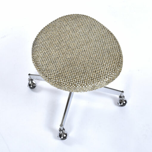 Vintage foot stool on casters