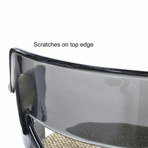 Scratches along back edge of chair