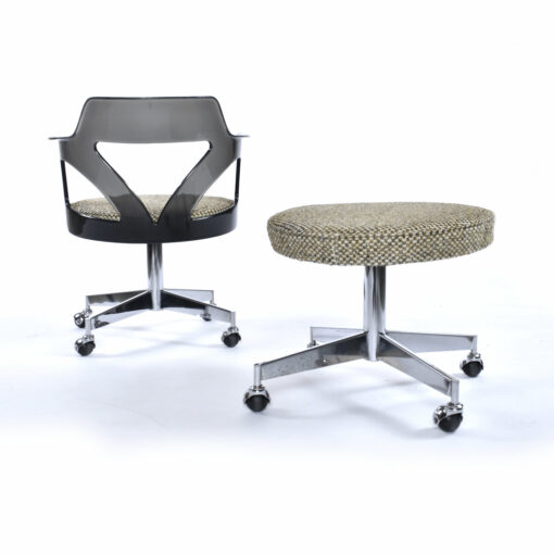 Back view of Conwed Smoked Lucite armchair on wheels