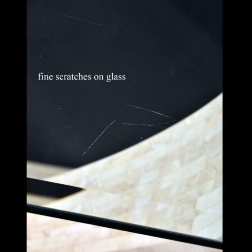 Scratches on glass sofa table