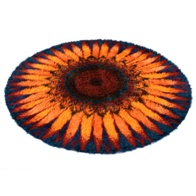 Nearly 8ft round sunflower rya rug