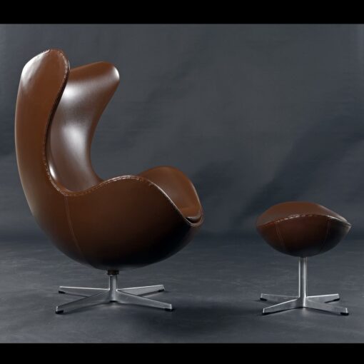 Arne Jacobsen brown leather Egg chair with matching foot stool
