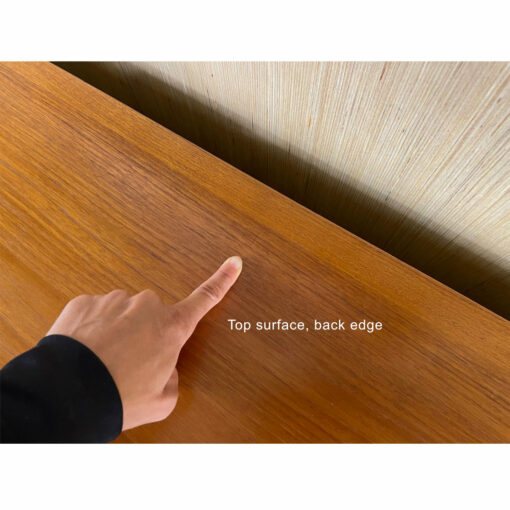 Scratch on top of Danish Modern teak credenza with sliding doors