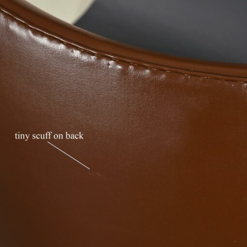 Blemish on brown leather