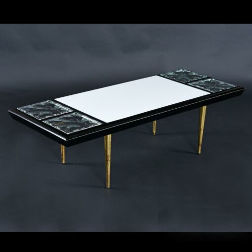 White and black mid-century modern coffee table with gold legs