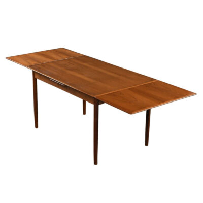 Danish teak draw-leaf dining table