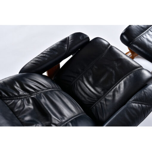 Black leather Ekornes recliner chair