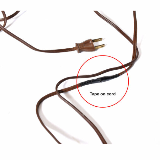 Lamp cord with tape on it