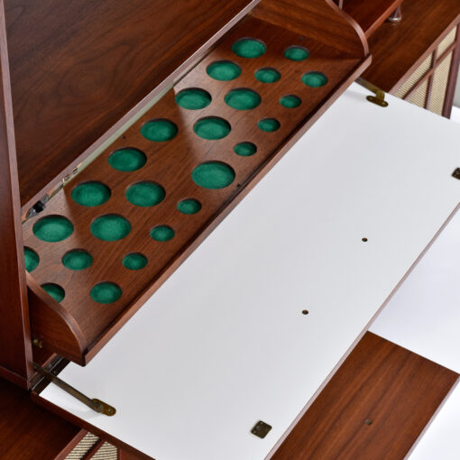 Dry bar inside Mid-Century Modern record player stereo hutch
