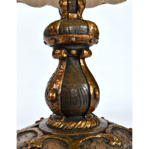 Plaster lamp surface mimicking wood and hammered metal