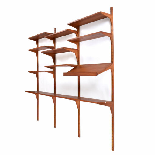 Danish teak wall mounted adjustable shelves by Poul Cadovius