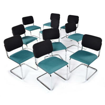 Black and Blue upholstered Marcel Breuer Cesca chairs