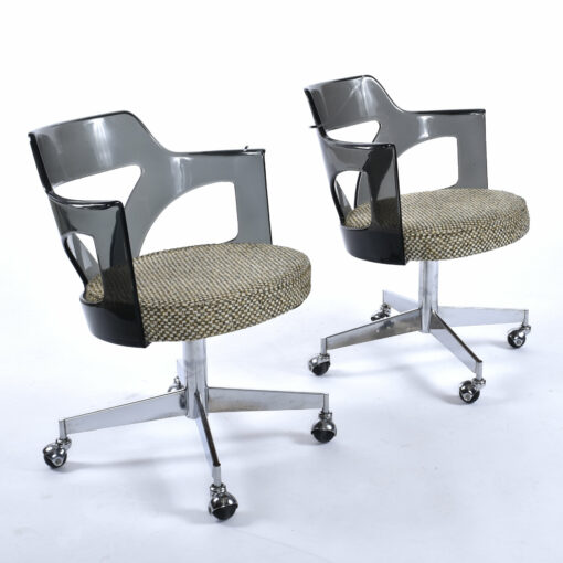 Pair Conwed Space Age Lucite chairs on casters