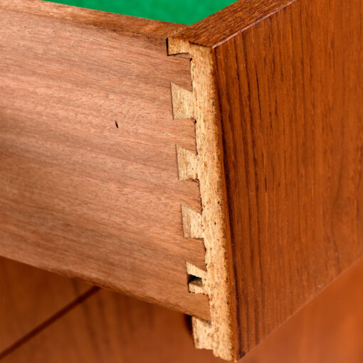 Dovetailed drawers on Danish teak sideboard