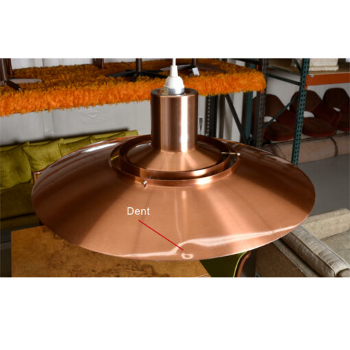 Dent on top of lamp shade