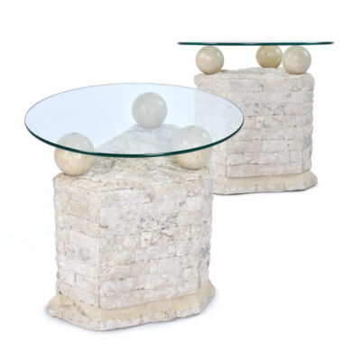 Pair of Mactan stone pedestal end tables with new round glass