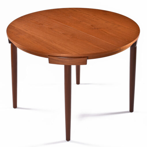 Expandable Frem Rojle and Hans Olsen roundette Danish teak dining table