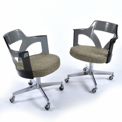 Pair Space Age Lucite chairs on casters