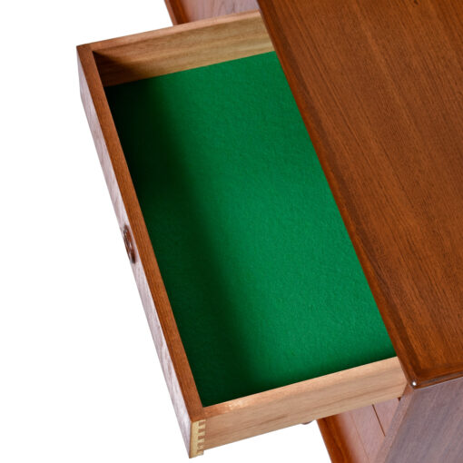 Felt lined green drawer on Danish teak sideboard
