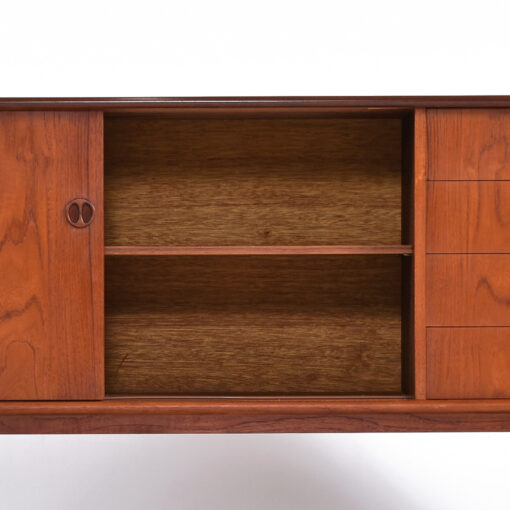 Adjustable shelf inside Danish teak sideboard