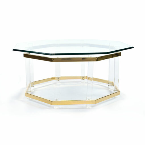 Profile view of clear acrylic and brass coffee table