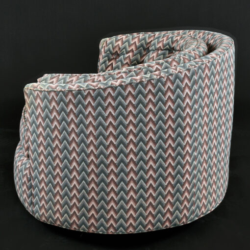 Blue gray and mauve swivel barrel tub chairs